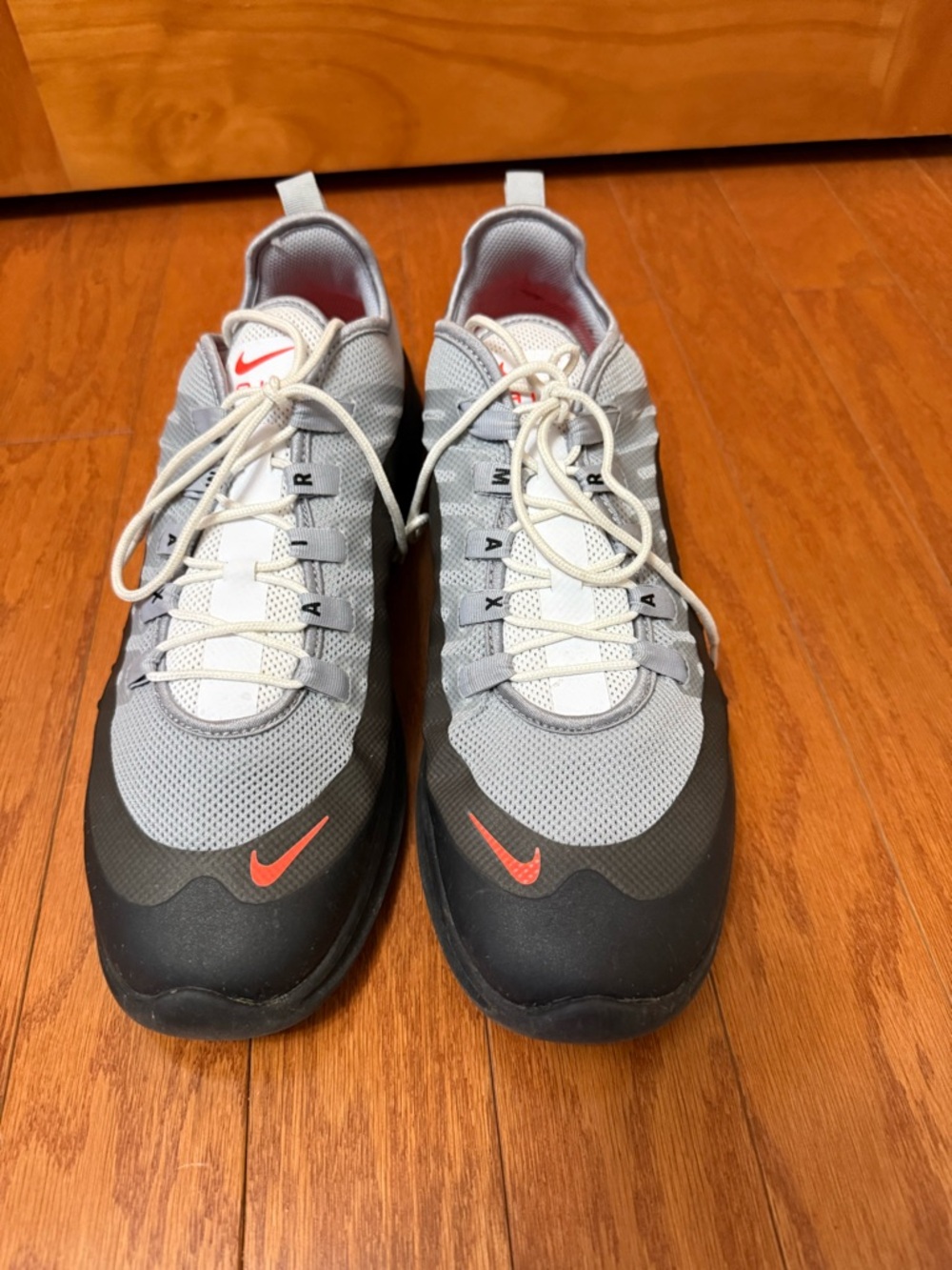 Nike Air Max Grey and Black Sneakers with Orange Swoosh